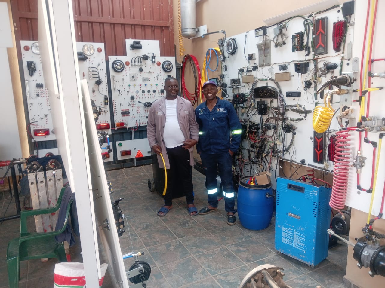 Trainer and artisan in automotive electrical lab